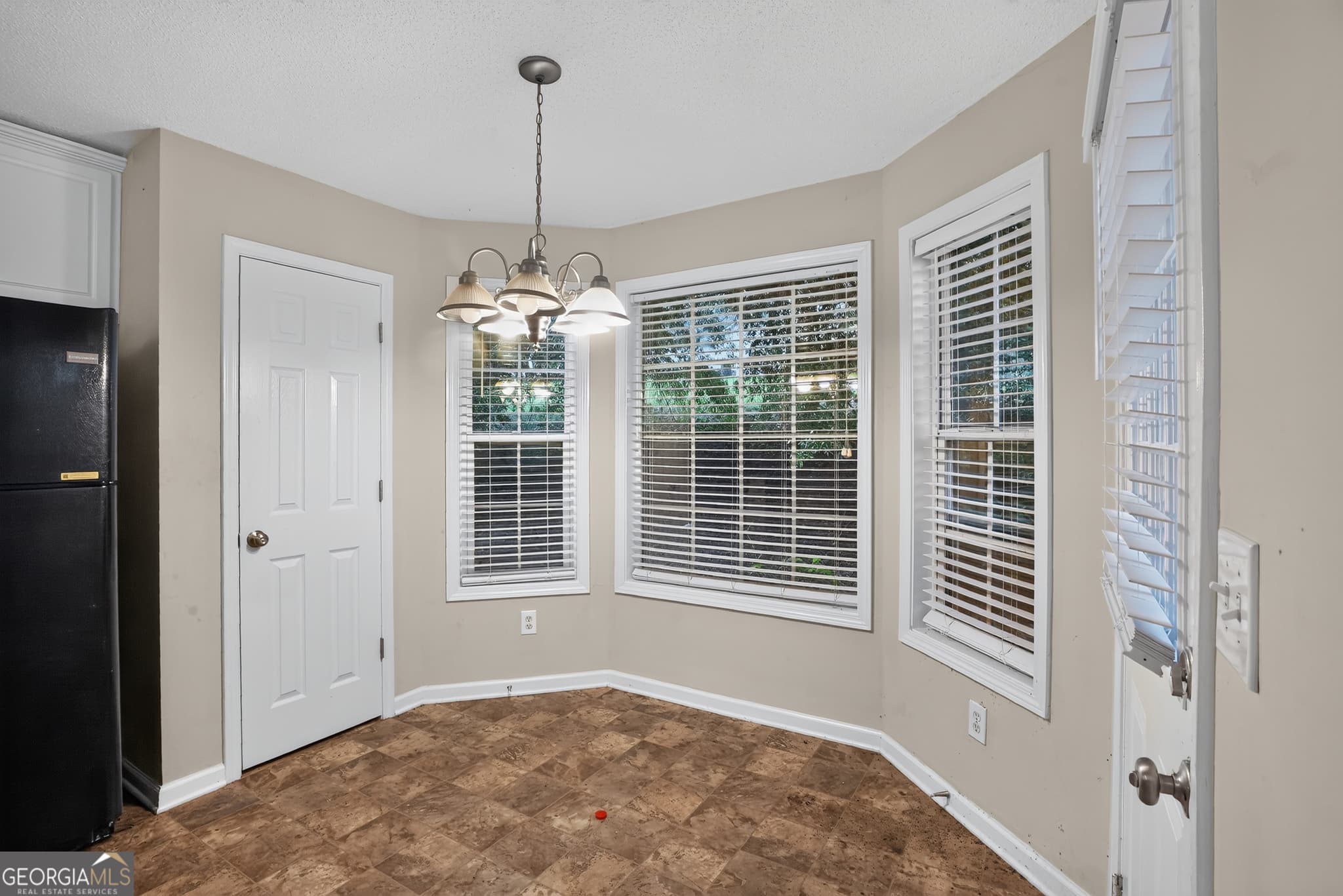 4 bedroom, 2.5 bathroom, 1,831 sq ft single family residence for sale at 709 Patriots Point Street, Locust Grove, GA 30248 — photo 7