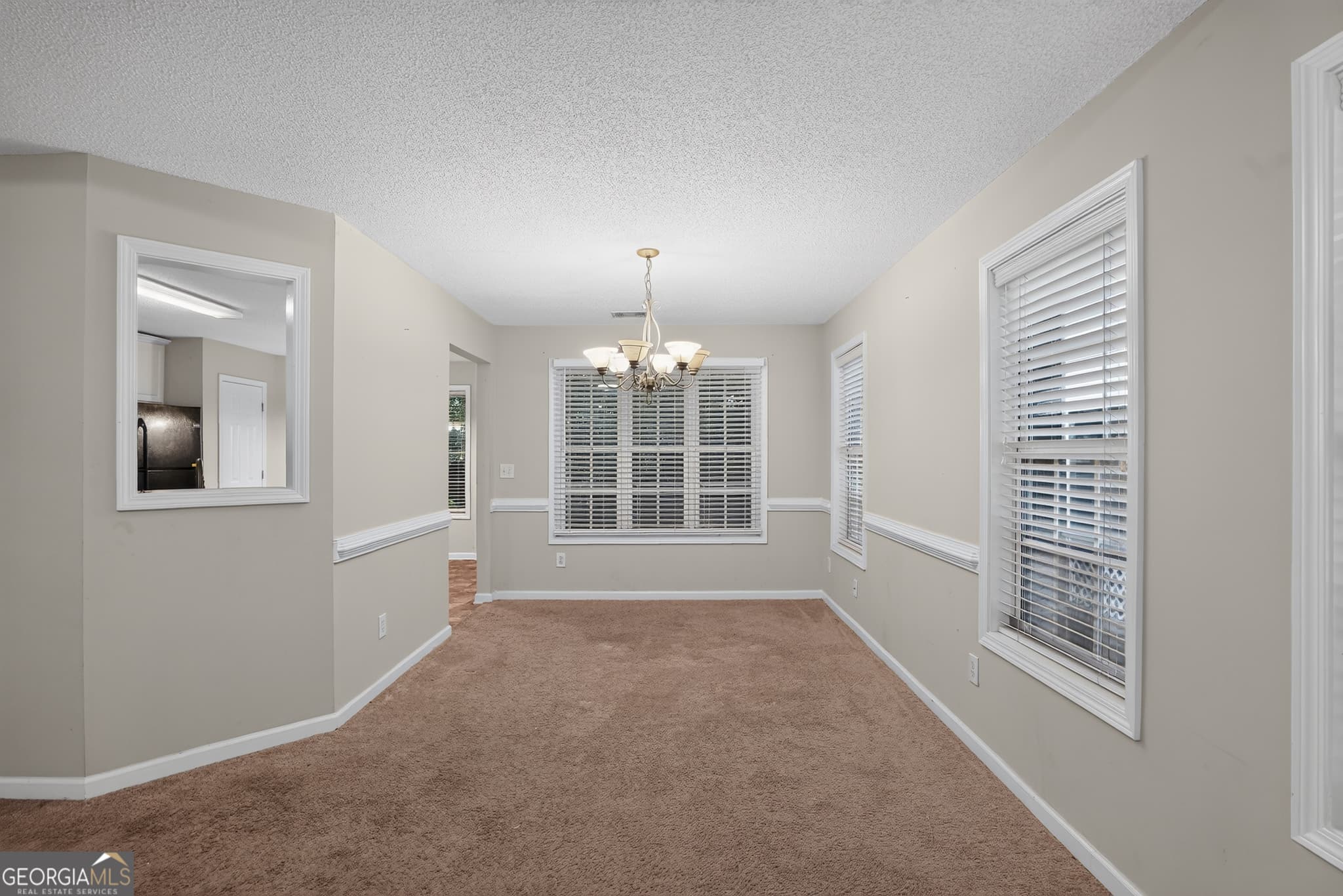 4 bedroom, 2.5 bathroom, 1,831 sq ft single family residence for sale at 709 Patriots Point Street, Locust Grove, GA 30248 — photo 5