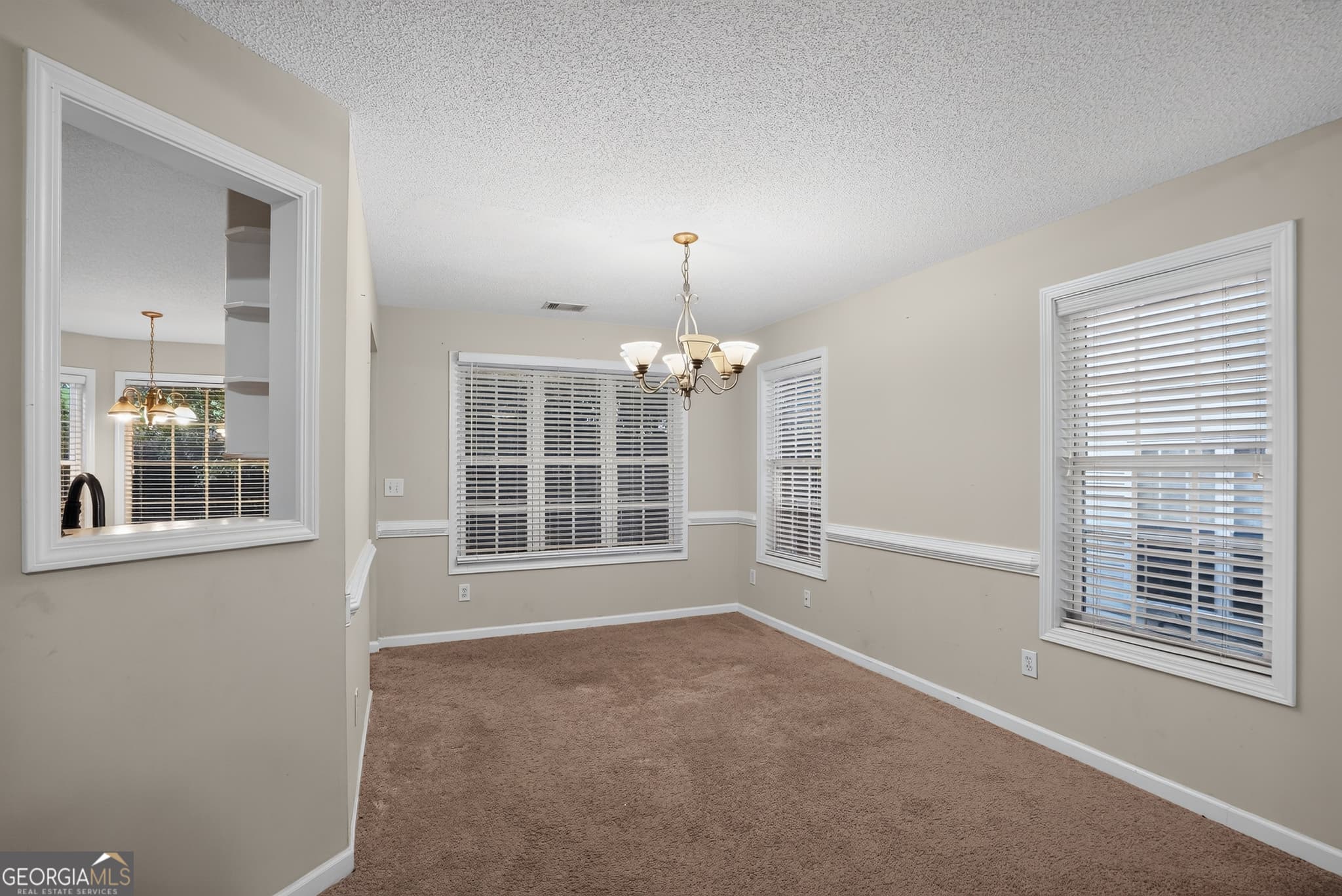 4 bedroom, 2.5 bathroom, 1,831 sq ft single family residence for sale at 709 Patriots Point Street, Locust Grove, GA 30248 — photo 4