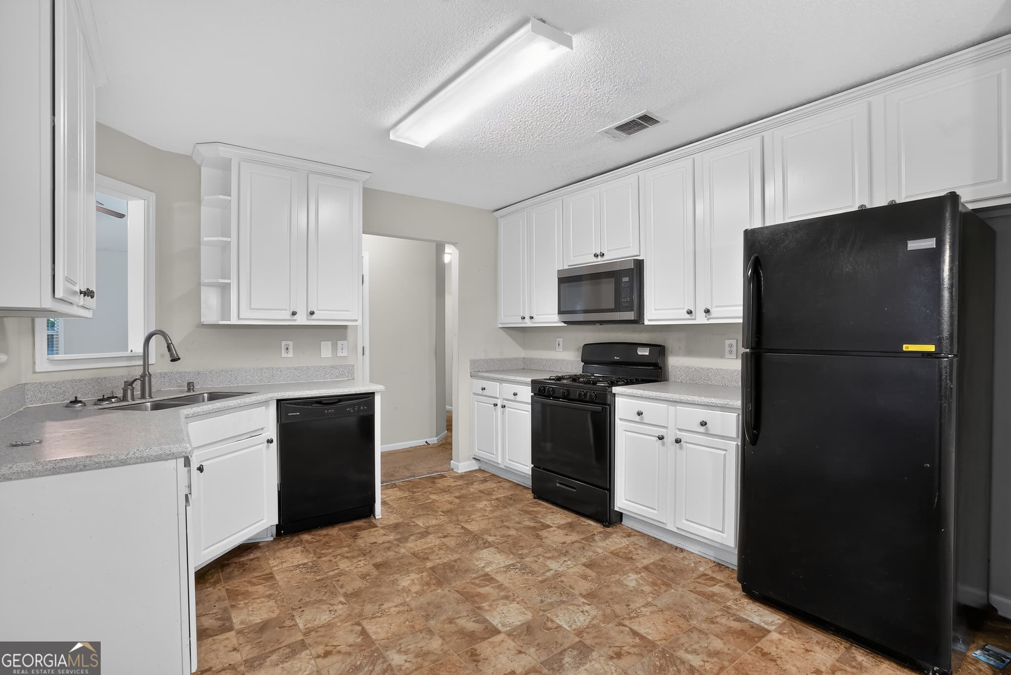 4 bedroom, 2.5 bathroom, 1,831 sq ft single family residence for sale at 709 Patriots Point Street, Locust Grove, GA 30248 — photo 8