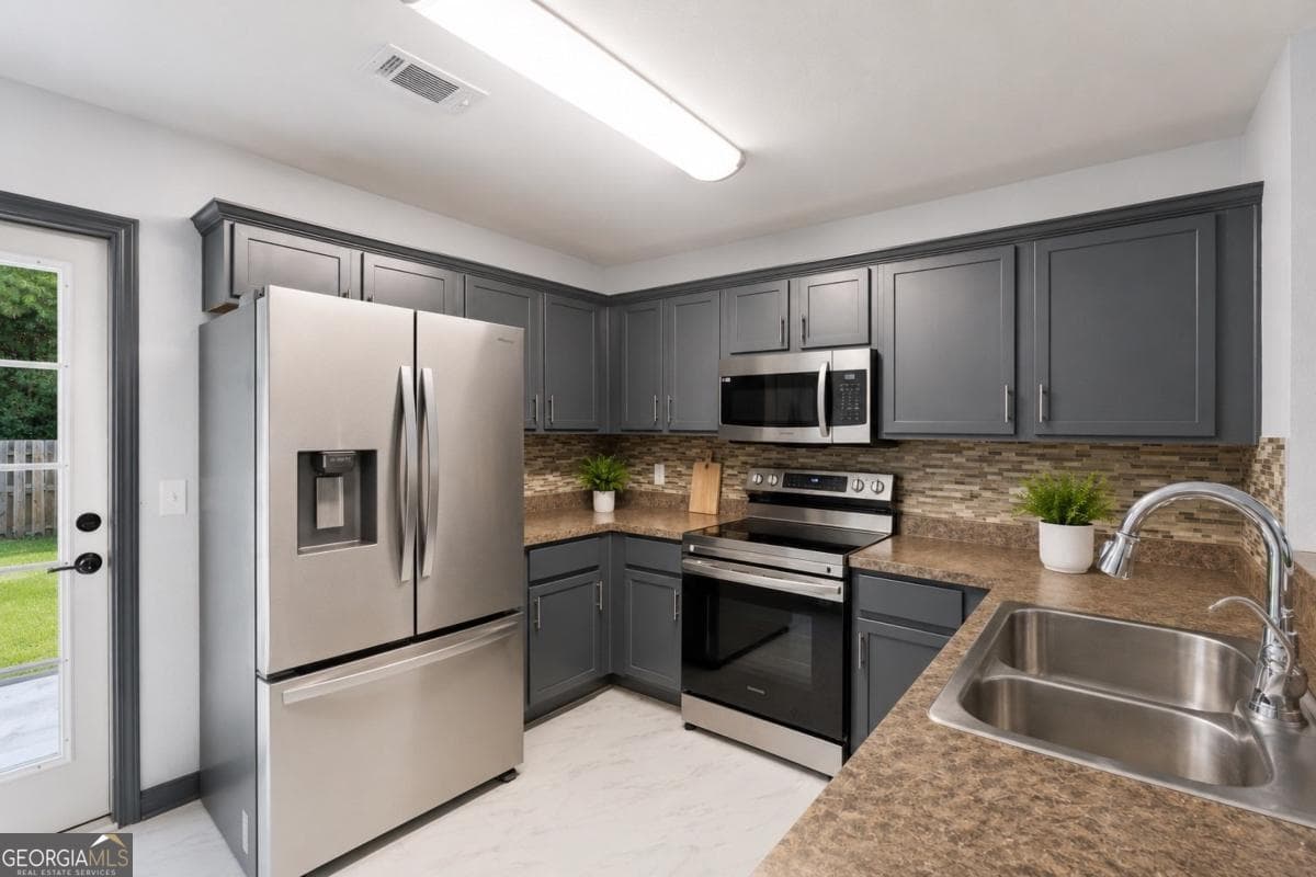4 bedroom, 2 bathroom, 1,356 sq ft single family residence for sale at 28 Twin Oaks Place, Savannah, GA 31407 — photo 9