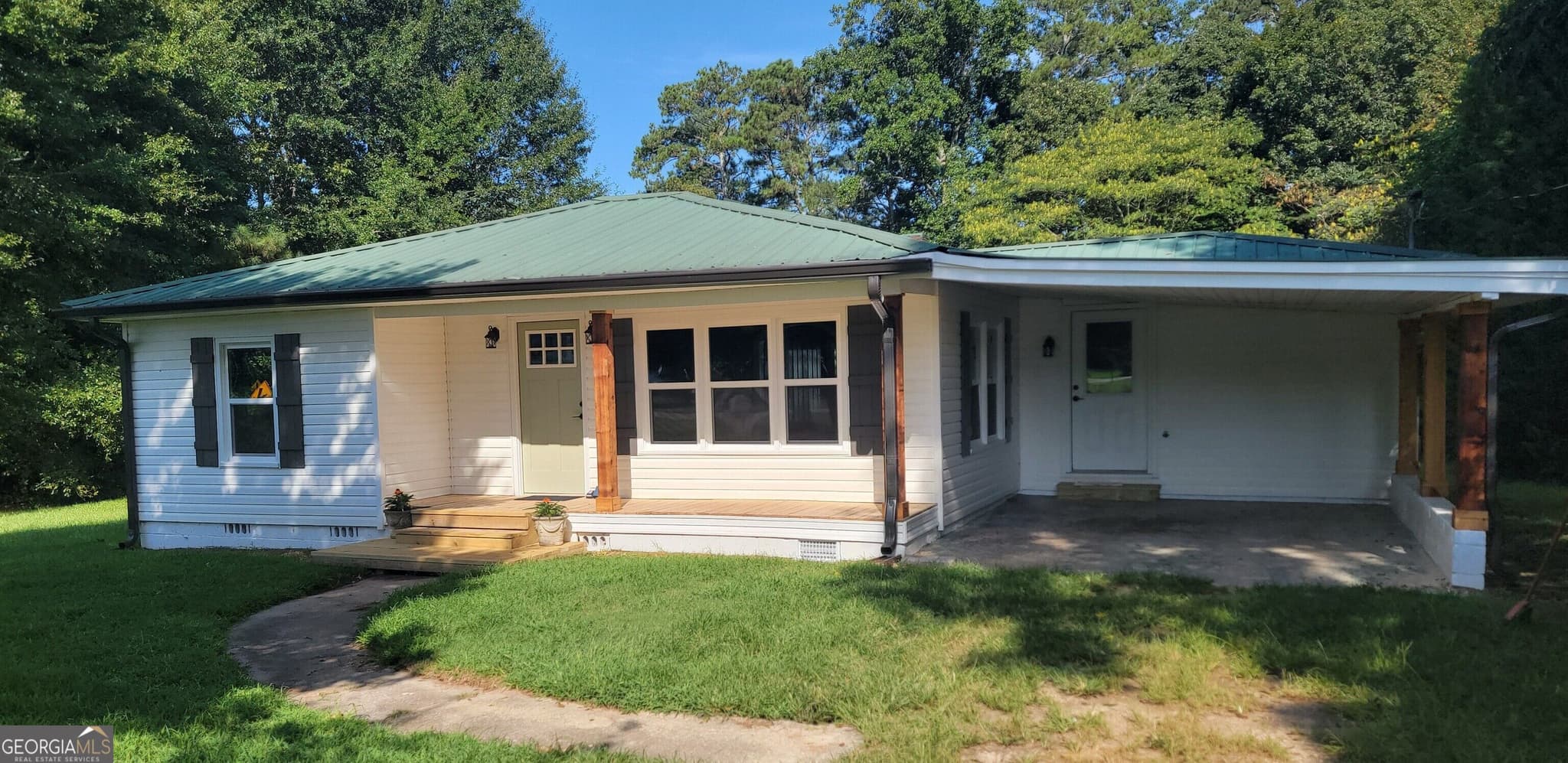2 bedroom, 1 bathroom, 970 sq ft single family residence for sale at 1477 S 100 Highway, Bowdon, GA 30108 — photo 2