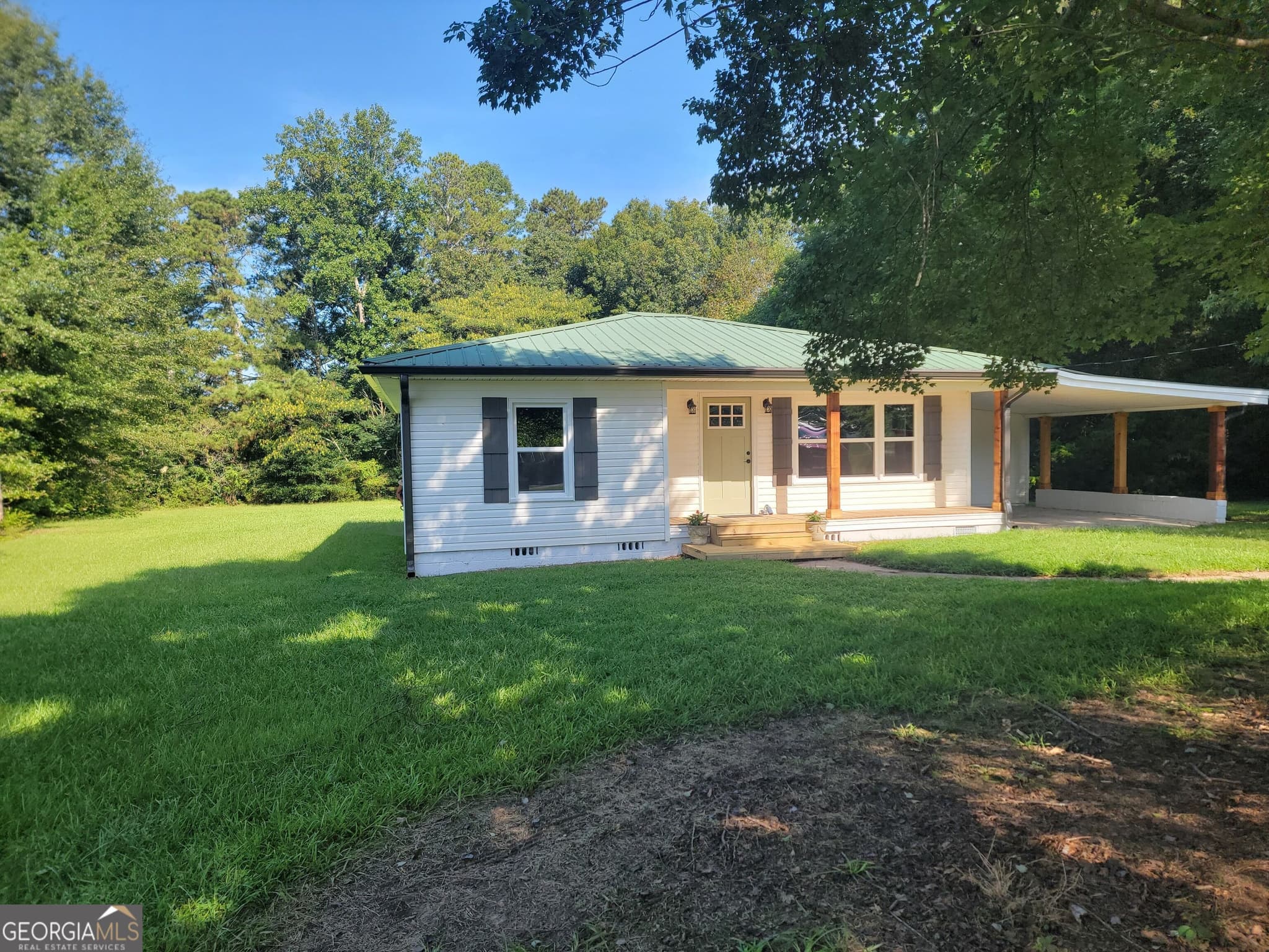 2 bedroom, 1 bathroom, 970 sq ft single family residence for sale at 1477 S 100 Highway, Bowdon, GA 30108 — photo 3