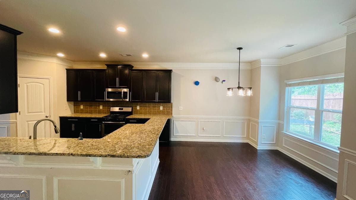 4 bedroom, 3.5 bathroom, 3,164 sq ft single family residence for sale at 1673 Wilson Manor Circle, Lawrenceville, GA 30045 — photo 8