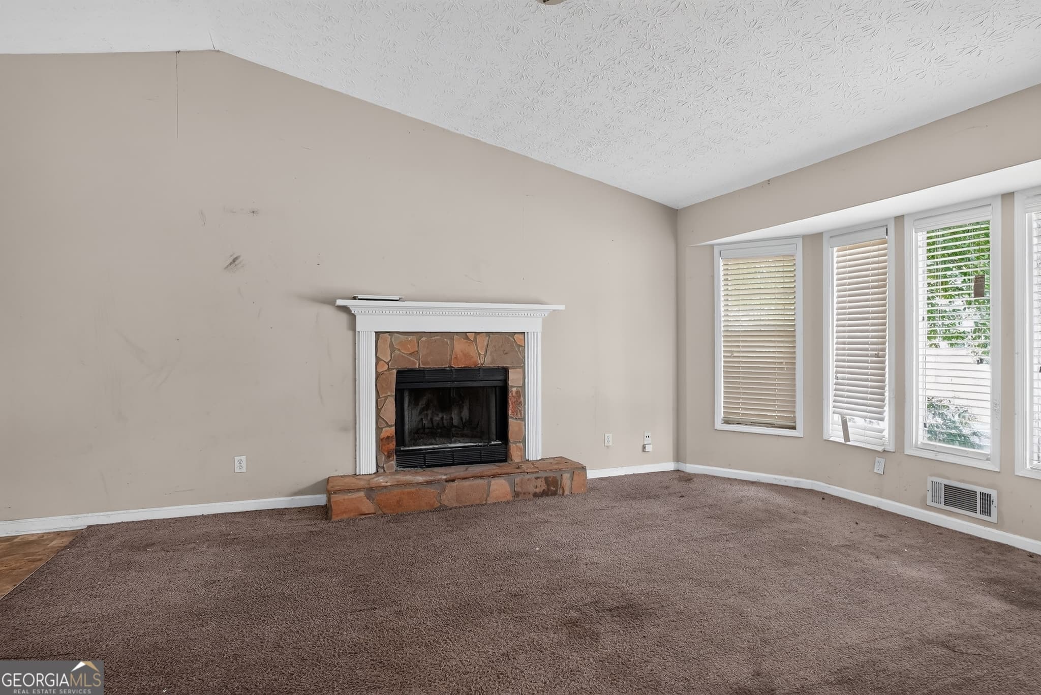 4 bedroom, 3 bathroom, 2,010 sq ft single family residence for sale at 6409 Eastbriar Drive, Lithonia, GA 30058 — photo 3