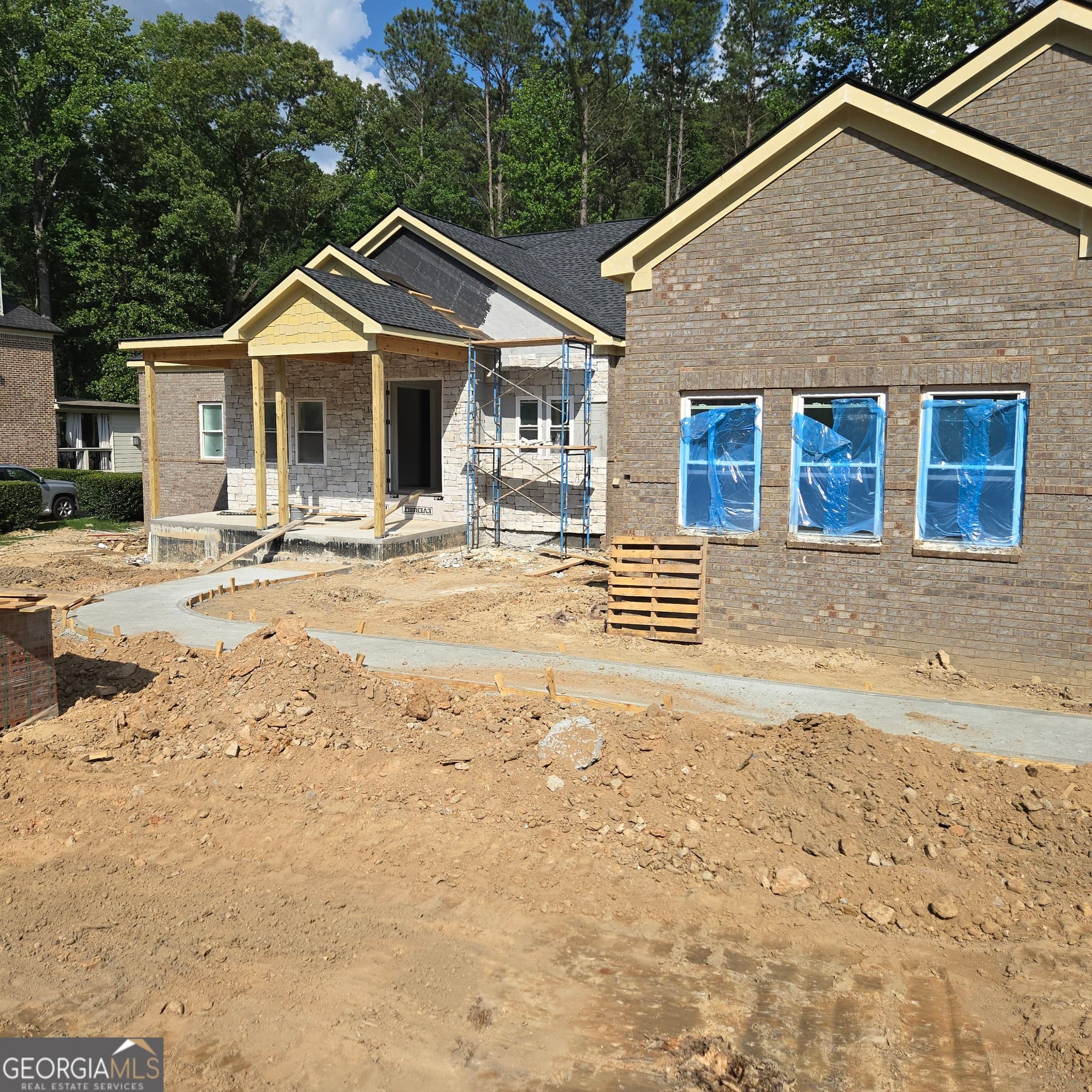 4 bedroom, 3.5 bathroom, 4,561 sq ft single family residence for sale at 5670 Eternal Drive, South Fulton, GA 30349 — photo 2