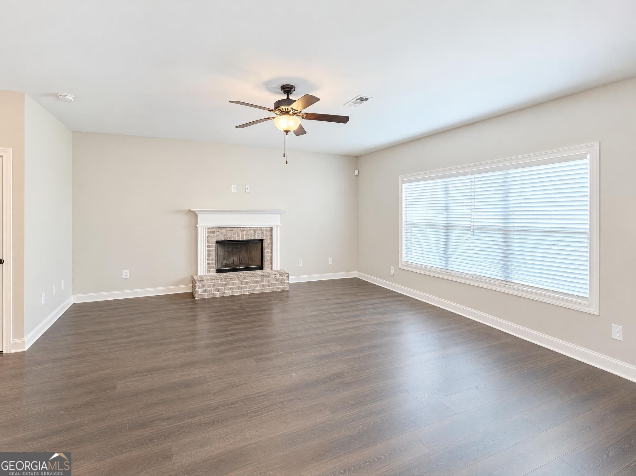 4 bedroom, 3.5 bathroom, 3,791 sq ft single family residence for sale at 1801 Sycamore Drive, Loganville, GA 30052 — photo 3
