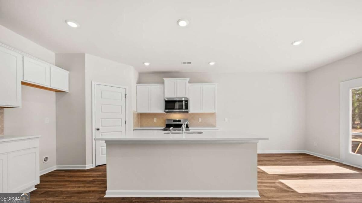 5 bedroom, 3 bathroom single family residence for sale at 964 Bergamot Way, Locust Grove, GA 30248 — photo 5