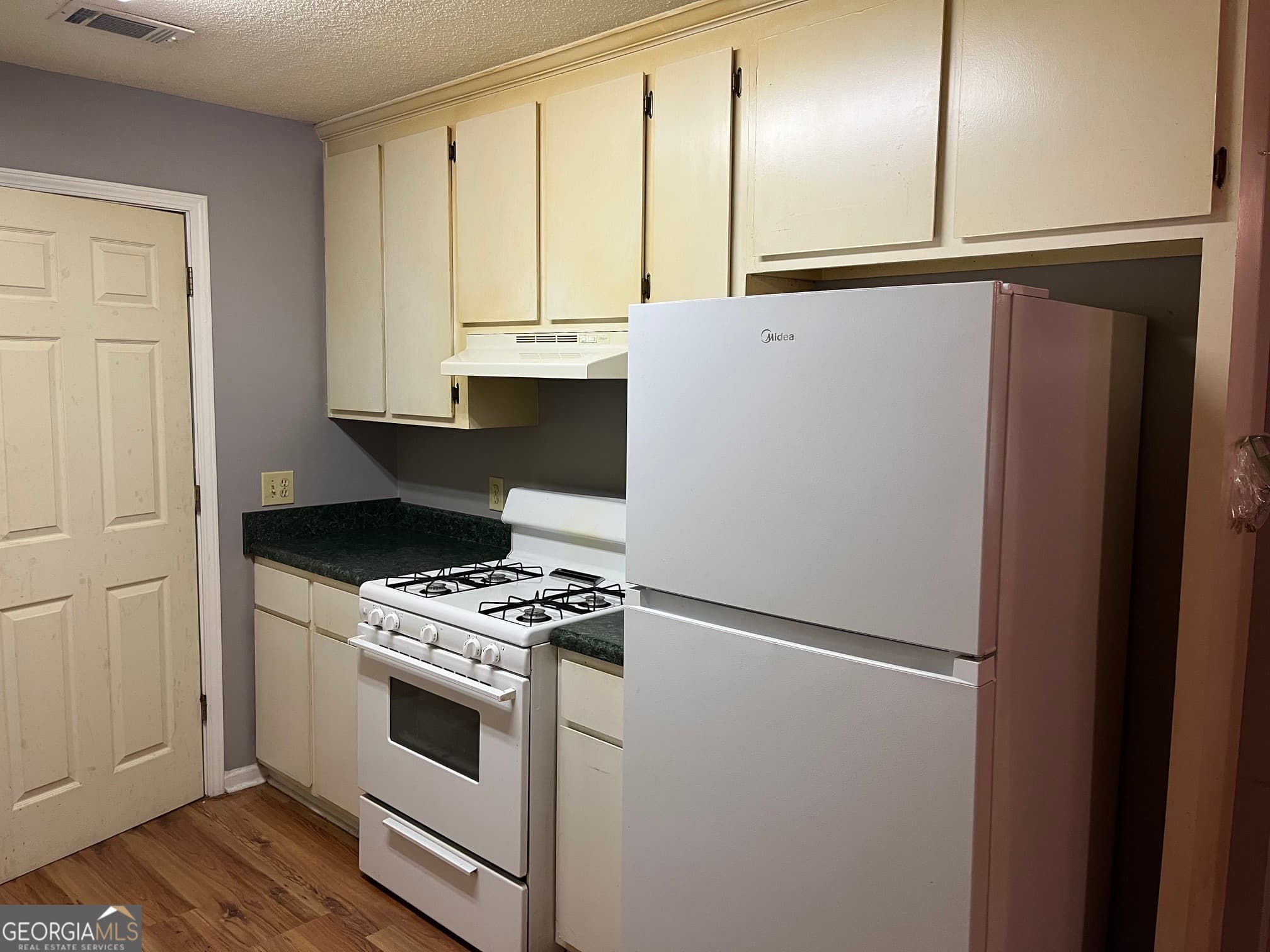 3 bedroom, 2 bathroom, 2,512 sq ft single family residence for sale at 628 Ellis Church Road, Haddock, GA 31033 — photo 6