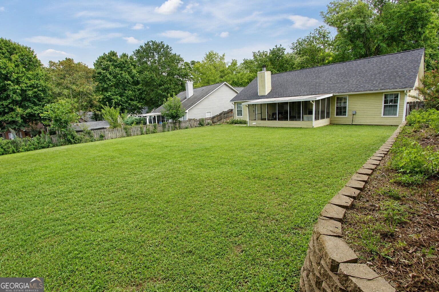 4 bedroom, 2 bathroom, 1,668 sq ft single family residence for sale at 5165 Sterling Trace Court, Lilburn, GA 30047 — photo 6