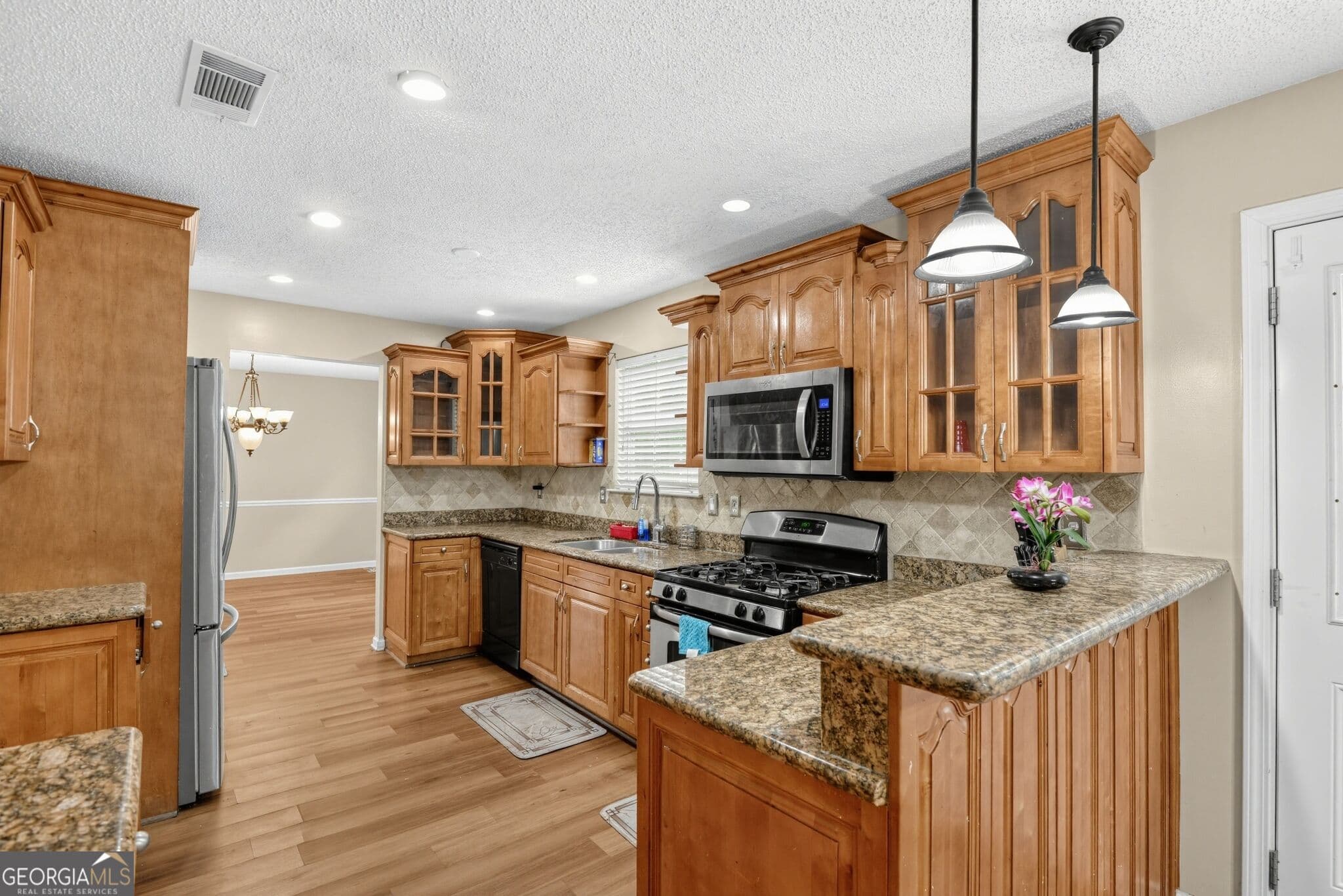 5 bedroom, 3 bathroom, 2,592 sq ft single family residence for rent at 1560 Rogers Crossing Drive, Lithonia, GA 30058 for $2,850 a month — photo 9
