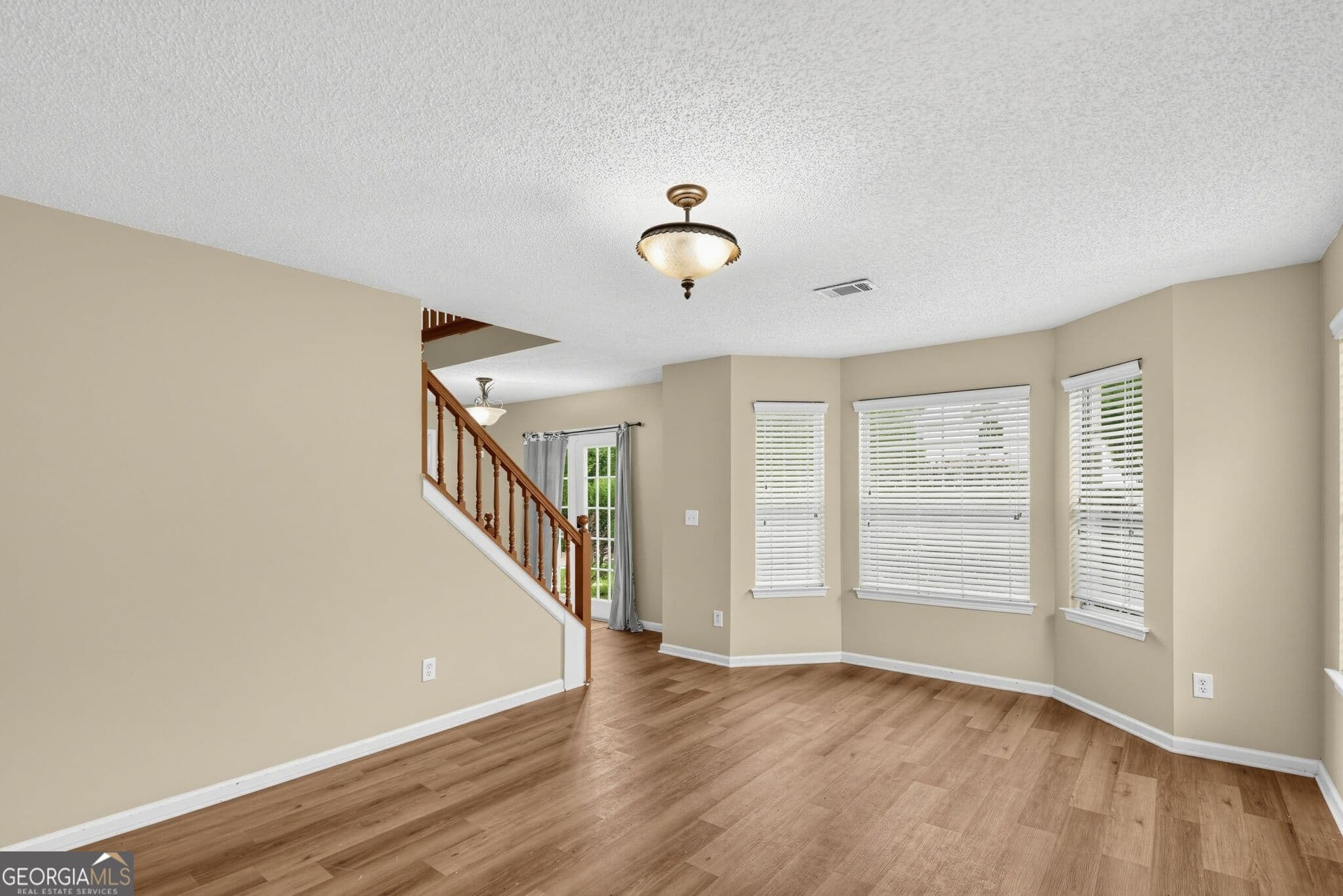 5 bedroom, 3 bathroom, 2,592 sq ft single family residence for rent at 1560 Rogers Crossing Drive, Lithonia, GA 30058 for $2,850 a month — photo 4