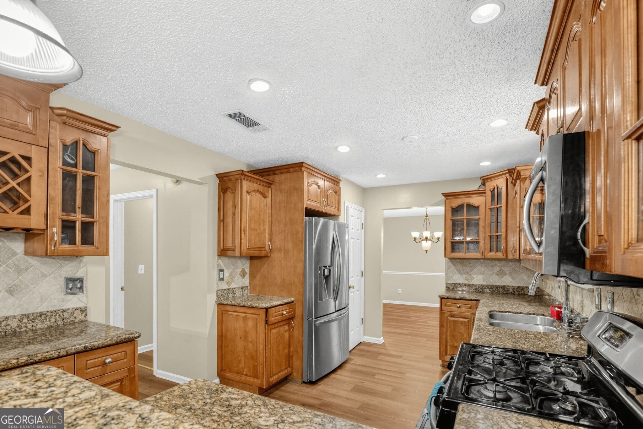 5 bedroom, 3 bathroom, 2,592 sq ft single family residence for rent at 1560 Rogers Crossing Drive, Lithonia, GA 30058 for $2,850 a month — photo 8