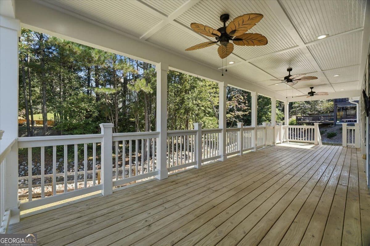 7 bedroom, 4 bathroom, 3,803 sq ft single family residence for sale at 6180 Lake Windsor Parkway, Buford, GA 30518 — photo 6
