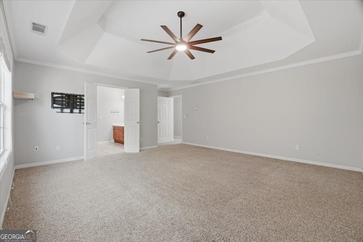 7 bedroom, 4 bathroom, 3,803 sq ft single family residence for sale at 6180 Lake Windsor Parkway, Buford, GA 30518 — photo 7