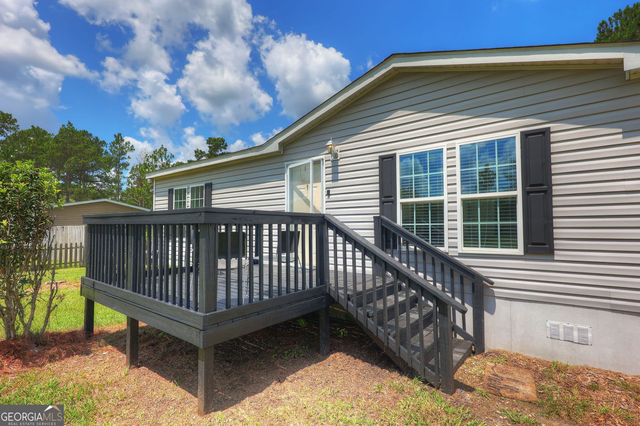 3 bedroom, 2 bathroom, 1,456 sq ft manufactured home,single family residence under contract at 1177 Egg And Butter Road, Ochlocknee, GA 31773 — photo 2