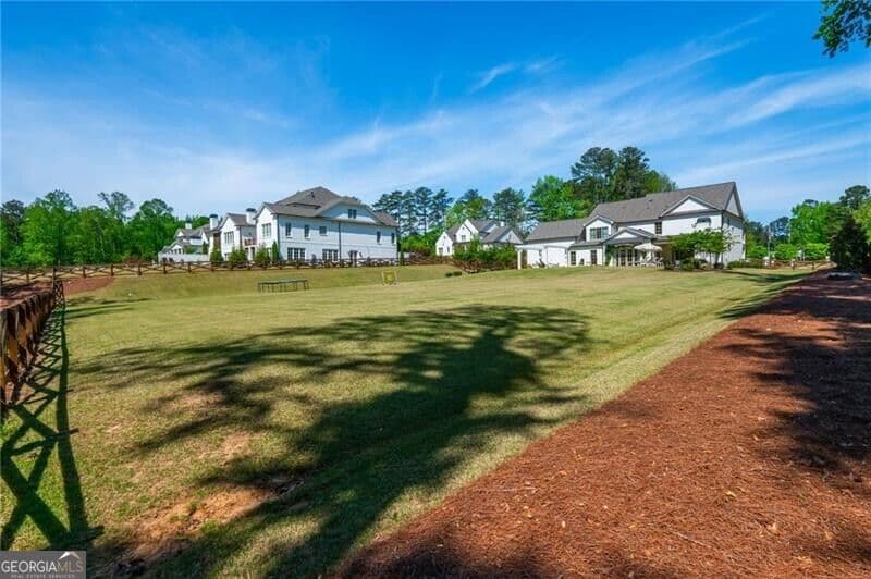 6 bedroom, 5.5 bathroom, 5,568 sq ft single family residence for sale at 4184 Thompson Mill Road, Buford, GA 30519 — photo 6