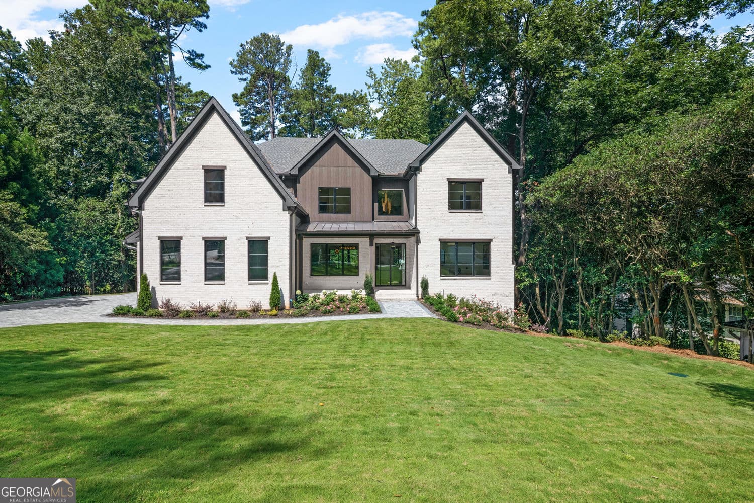 6 bedroom, 8 bathroom, 7,650 sq ft single family residence for sale at 4132 Haverhill Drive, Atlanta, GA 30342 — photo 2