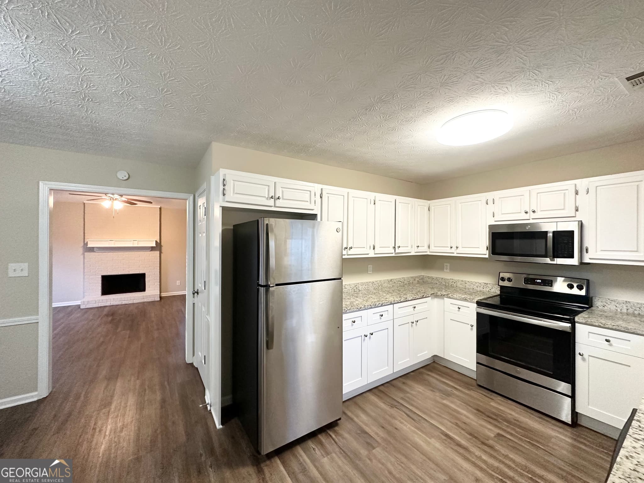 3 bedroom, 2 bathroom, 1,476 sq ft single family residence for sale at 1641 NE Riverchase Circle, Conyers, GA 30013 — photo 7