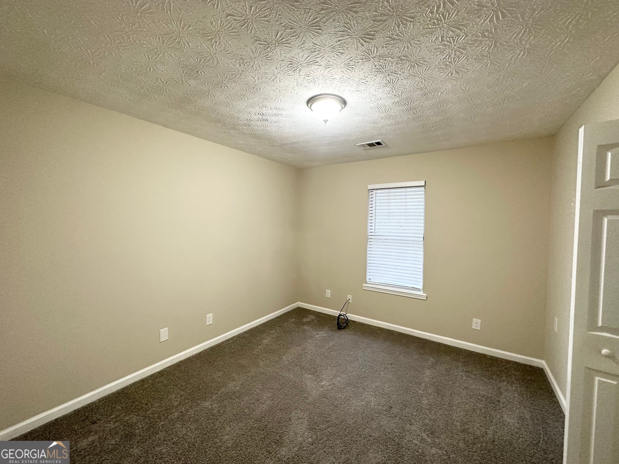 3 bedroom, 2 bathroom, 1,476 sq ft single family residence for sale at 1641 NE Riverchase Circle, Conyers, GA 30013 — photo 9
