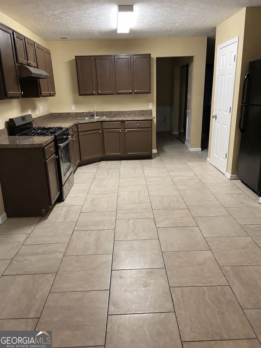 3 bedroom, 2.5 bathroom, 1,742 sq ft single family residence for sale at 10427 TOBANO Trail, Jonesboro, GA 30238 — photo 6