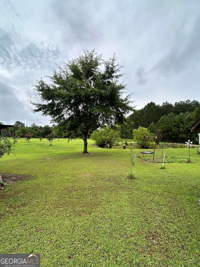 5 bedroom, 3 bathroom, 2,128 sq ft manufactured home,single family residence for sale at 1428 Gleaton Road N/A, Warwick, GA 31796 — photo 2