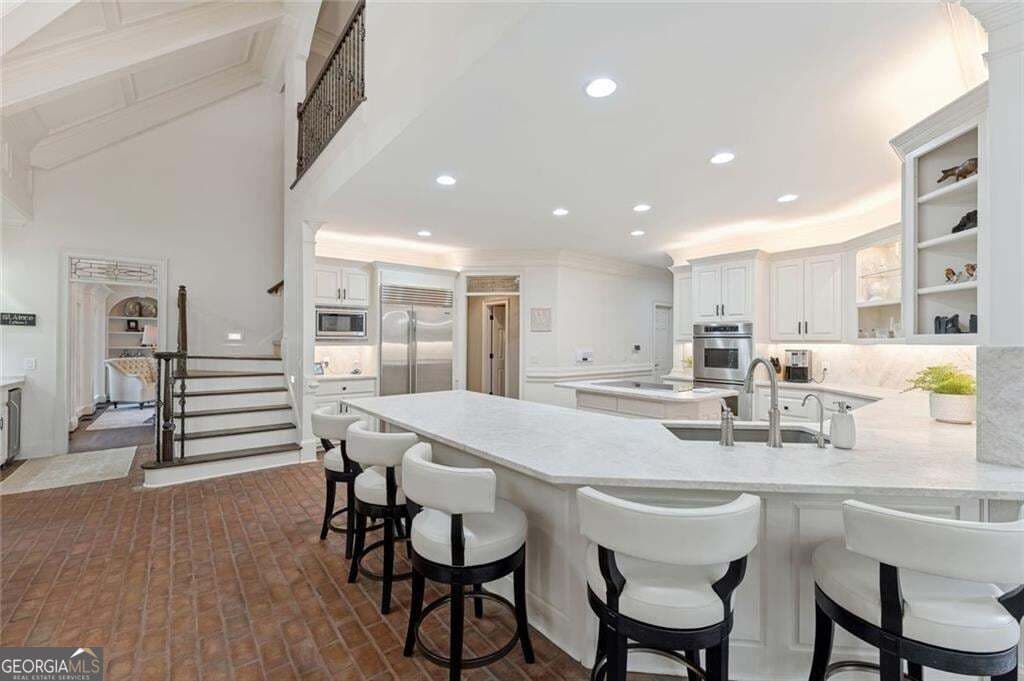 5 bedroom, 6 bathroom, 7,911 sq ft single family residence for sale at 2540 Sugarloaf Club Drive, Duluth, GA 30097 — photo 10