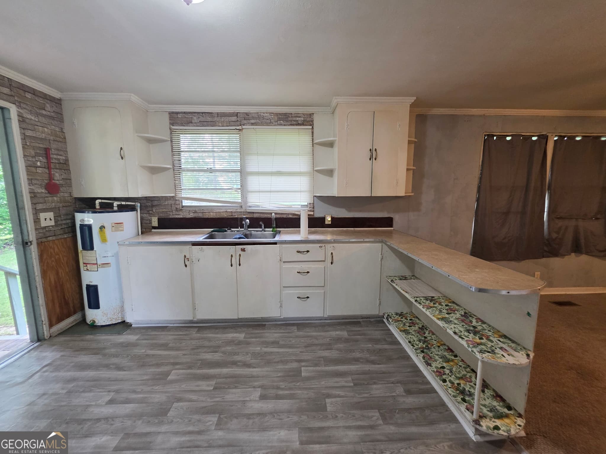 2 bedroom, 1 bathroom, 1,092 sq ft single family residence for sale at 1056 Tommy Purvis Jr Road, Reynolds, GA 31076 — photo 6