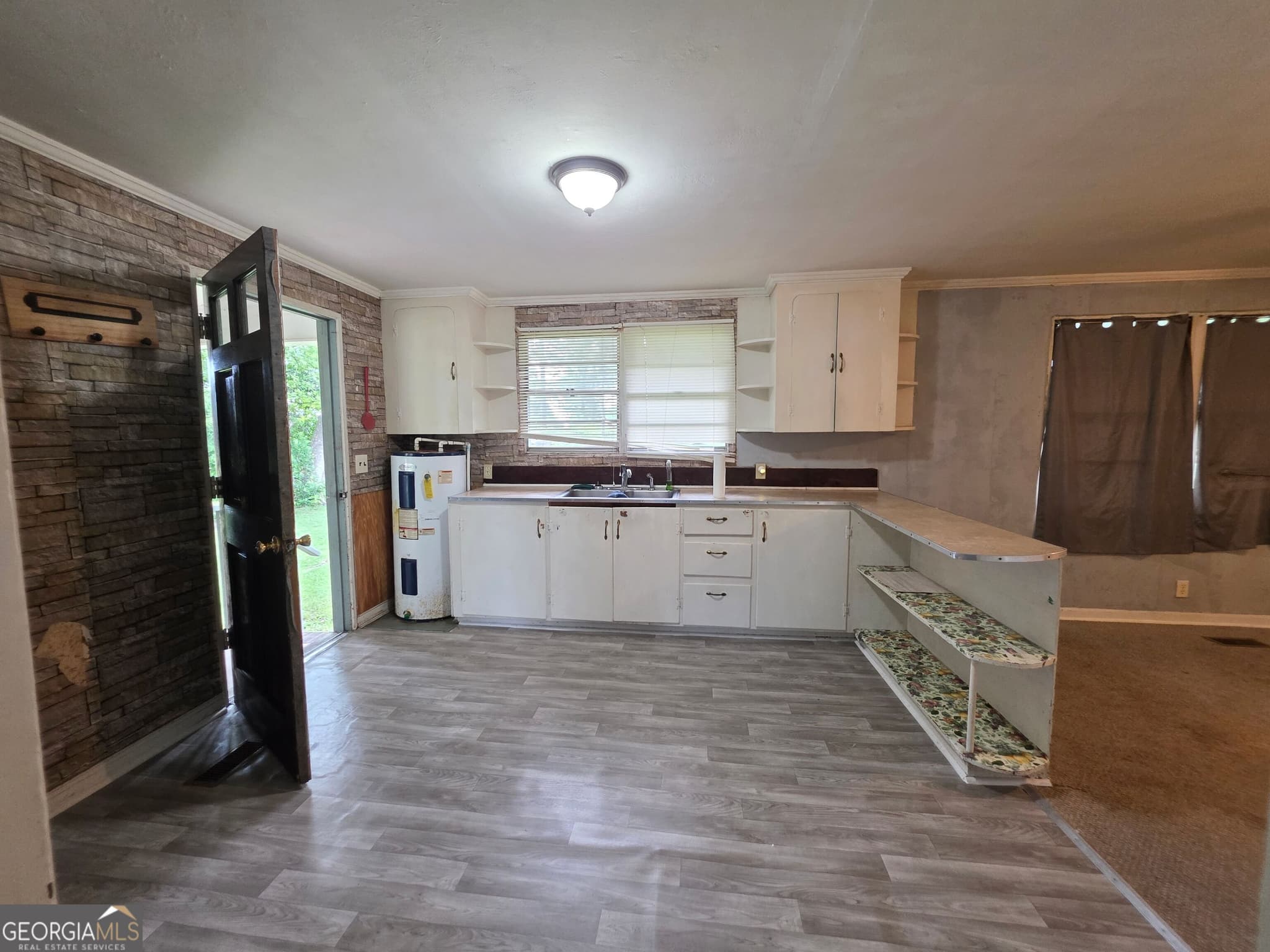 2 bedroom, 1 bathroom, 1,092 sq ft single family residence for sale at 1056 Tommy Purvis Jr Road, Reynolds, GA 31076 — photo 5