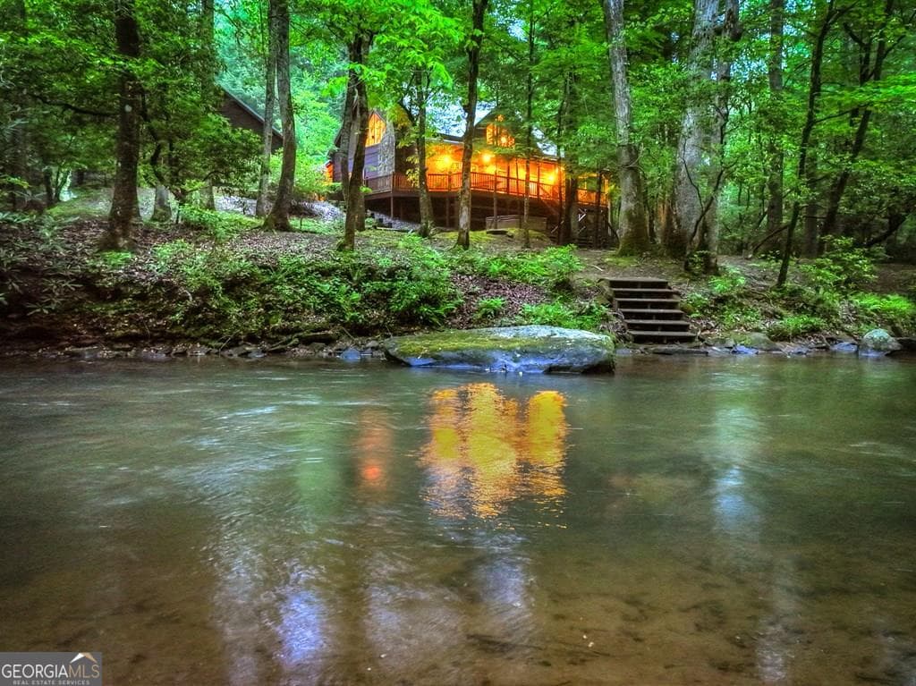 3 bedroom, 2 bathroom, 2,496 sq ft cabin,single family residence sold at 300 River Road, Cherry Log, GA 30522