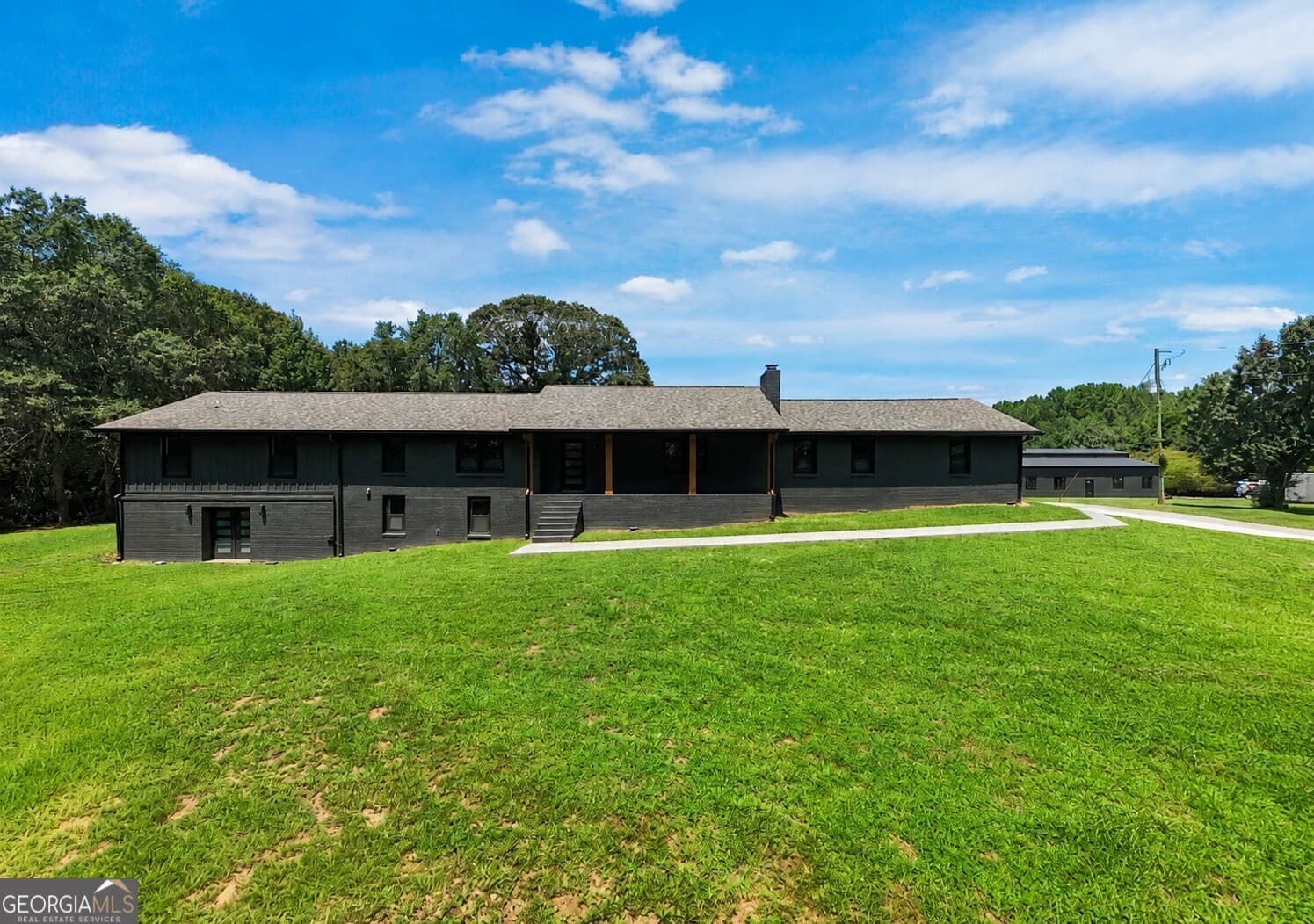 6 bedroom, 3 bathroom, 6,177 sq ft single family residence for sale at 280 Etheridge Road, Auburn, GA 30011 — photo 5