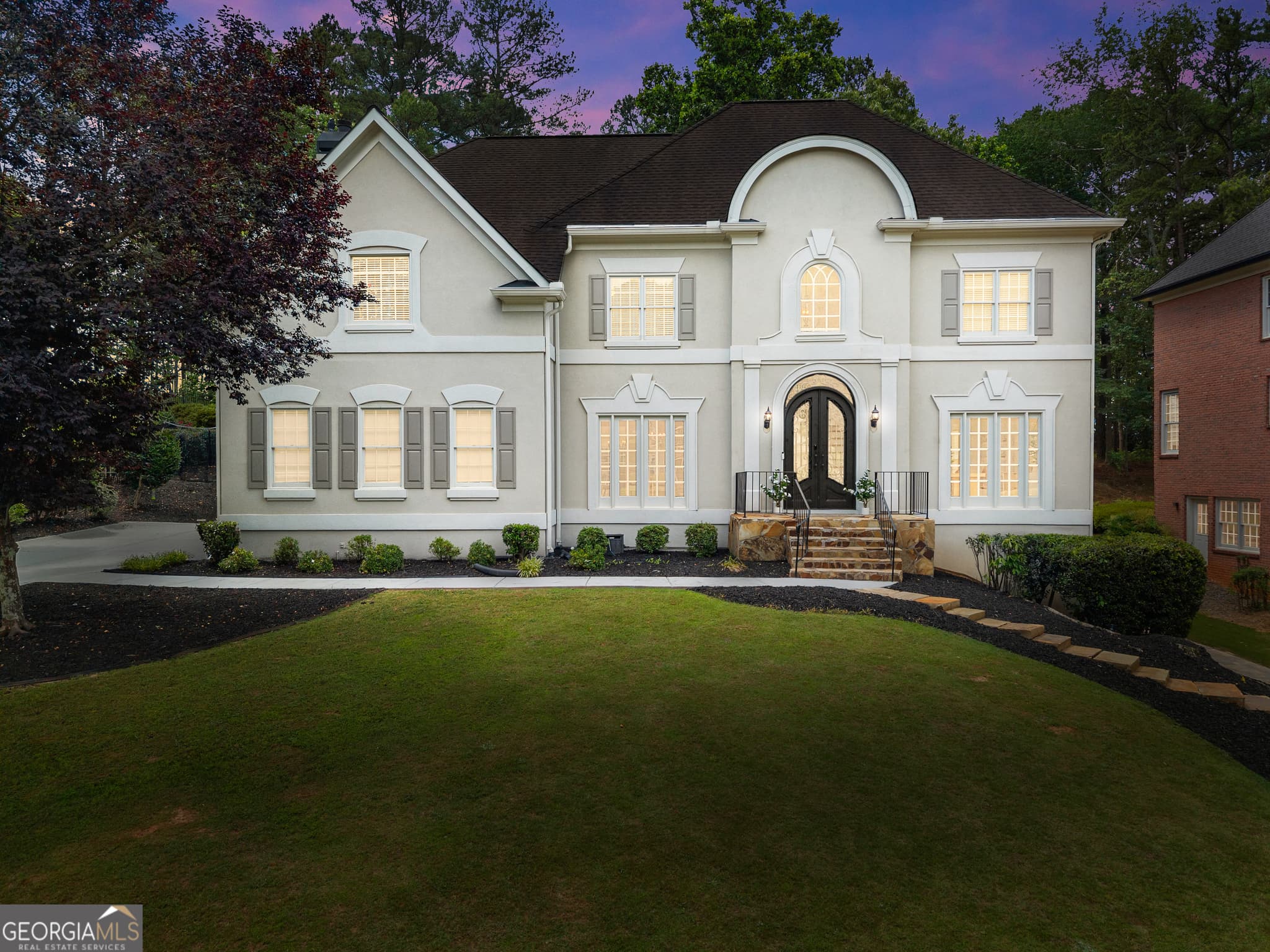 5 bedroom, 4.5 bathroom, 5,229 sq ft single family residence sold at 9345 Nesbit Lakes Drive, Alpharetta, GA 30022