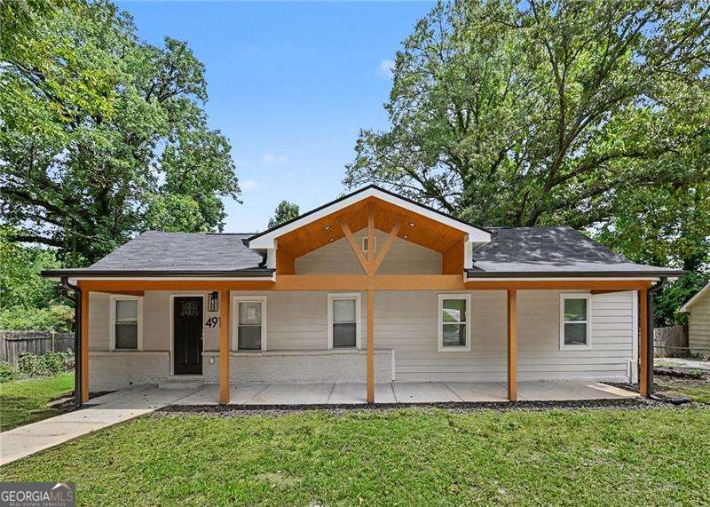 3 bedroom, 2 bathroom, 1,585 sq ft single family residence for sale at 4915 Campbellton Road, Atlanta, GA 30331 — photo 5