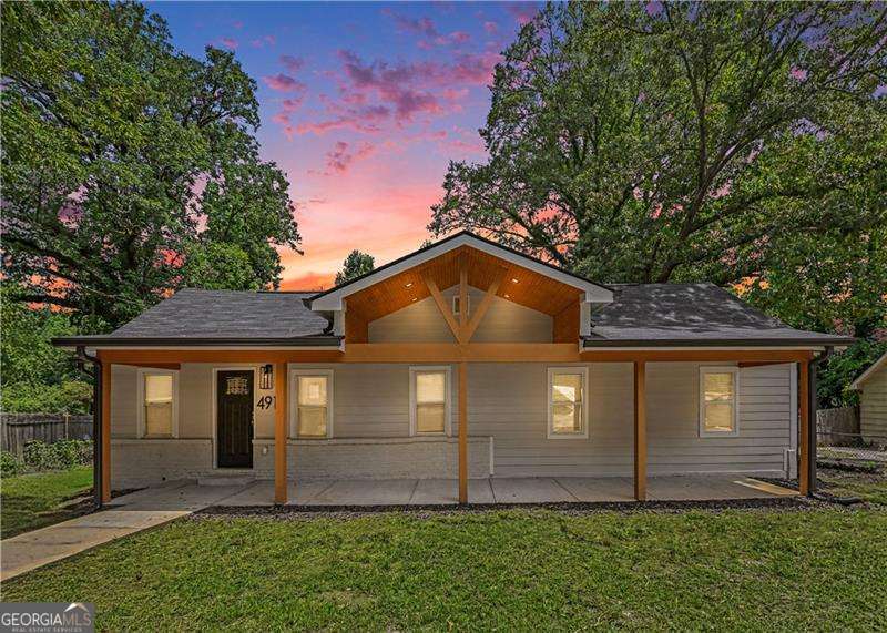 3 bedroom, 2 bathroom, 1,585 sq ft single family residence for sale at 4915 Campbellton Road, Atlanta, GA 30331 — photo 4