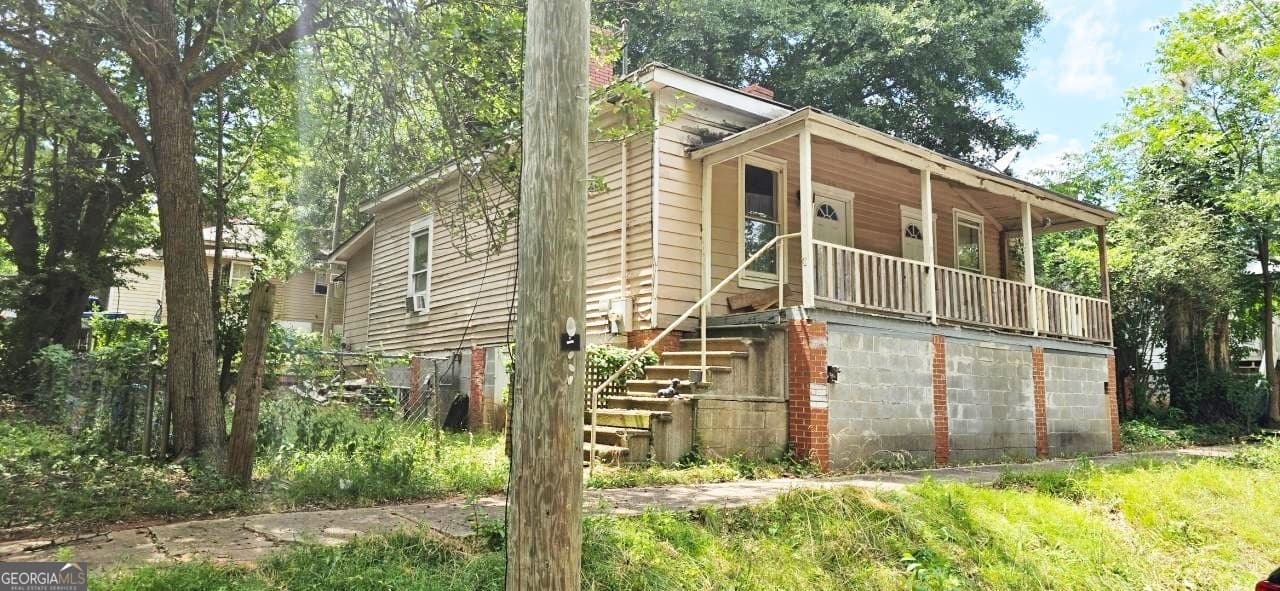 2 bedroom, 1 bathroom, 1,008 sq ft single family residence for sale at 7 Magnolia Street, Porterdale, GA 30014 — photo 2