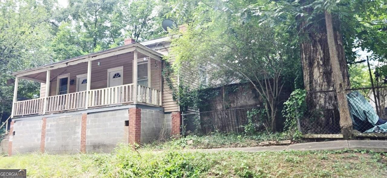 2 bedroom, 1 bathroom, 1,008 sq ft single family residence for sale at 7 Magnolia Street, Porterdale, GA 30014 — photo 3
