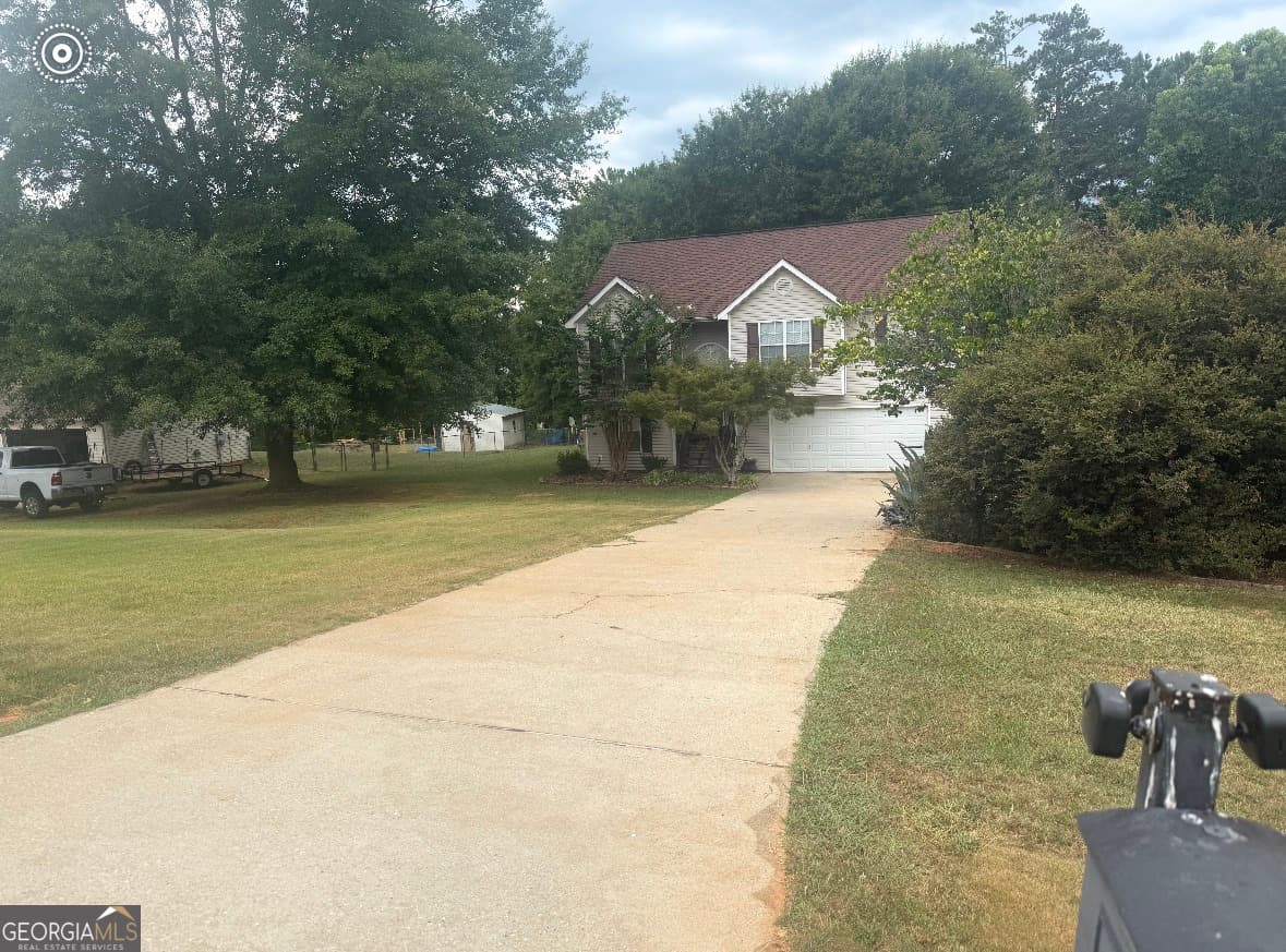 4 bedroom, 2 bathroom, 2,249 sq ft single family residence for sale at 112 Canterbury Court, Jackson, GA 30233 — photo 2