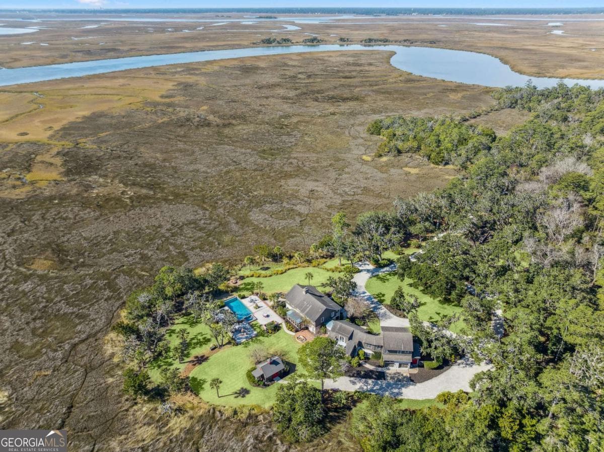 4 bedroom, 5 bathroom, 6,119 sq ft single family residence for sale at 400 Stevens Road, St. Simons, GA 31522 — photo 2