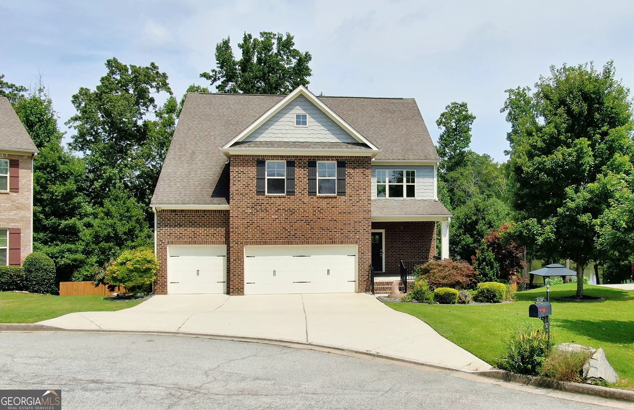 5 bedroom, 4 bathroom, 4,662 sq ft single family residence for sale at 2567 Restoration Drive, Powder Springs, GA 30127 — photo 2