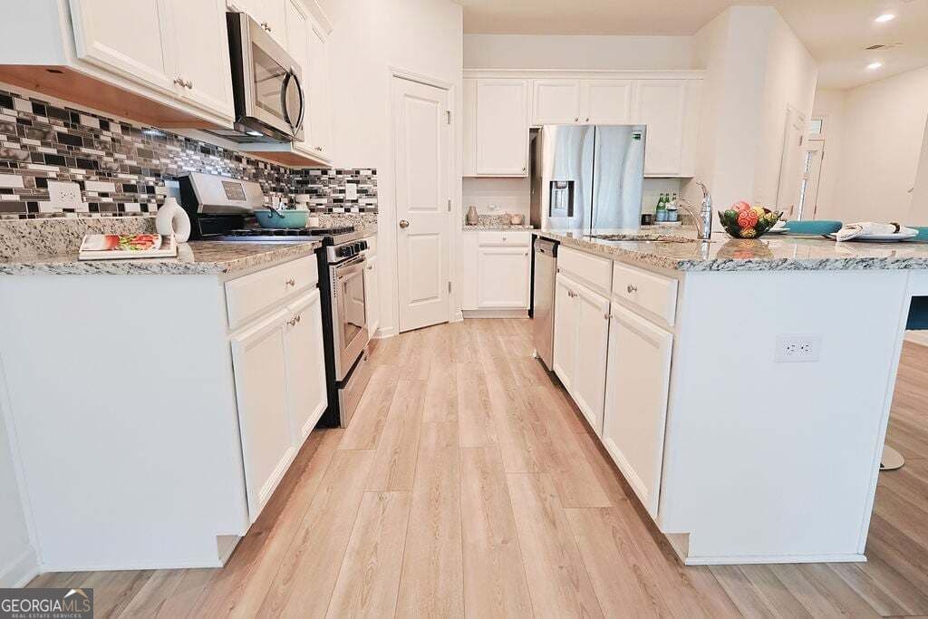3 bedroom, 2.5 bathroom, 1,901 sq ft townhouse for sale at 515 Sausalito Walk, Suwanee, GA 30024 — photo 9