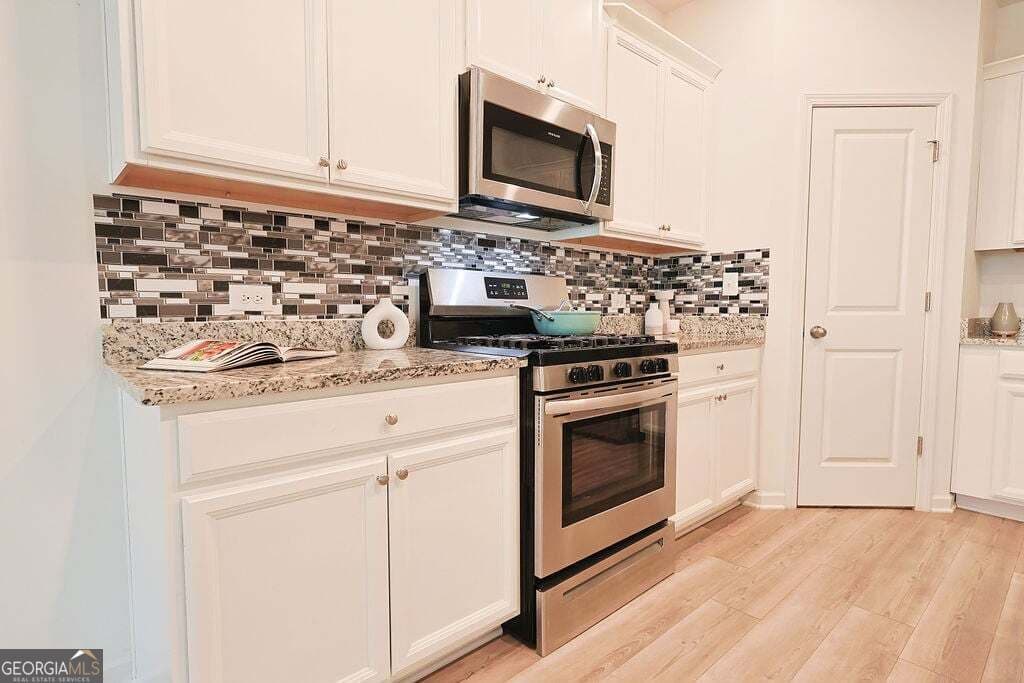 3 bedroom, 2.5 bathroom, 1,901 sq ft townhouse for sale at 515 Sausalito Walk, Suwanee, GA 30024 — photo 10