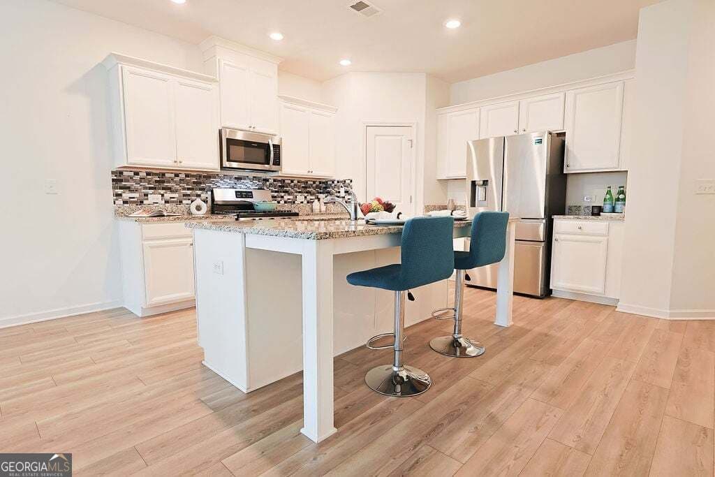 3 bedroom, 2.5 bathroom, 1,901 sq ft townhouse for sale at 515 Sausalito Walk, Suwanee, GA 30024 — photo 8