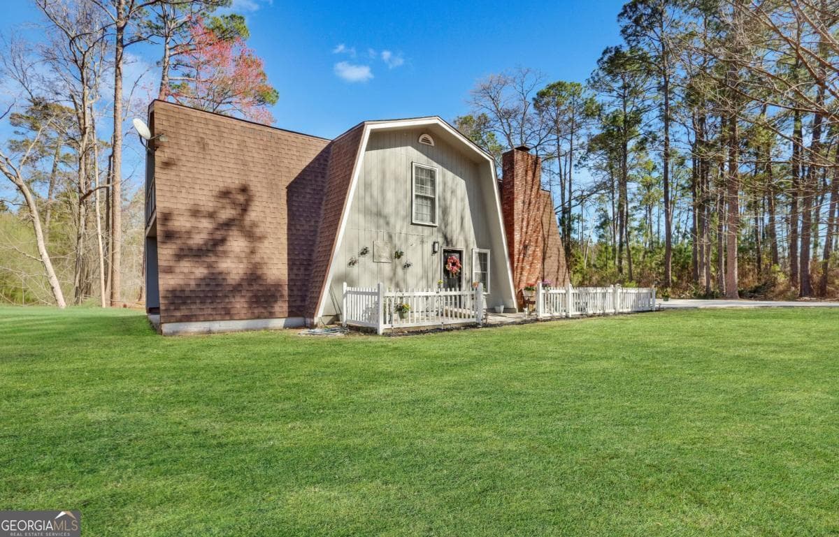 3 bedroom, 2 bathroom, 2,394 sq ft single family residence for sale at 2505 Odum Road South, Odum, GA 31555 — photo 2