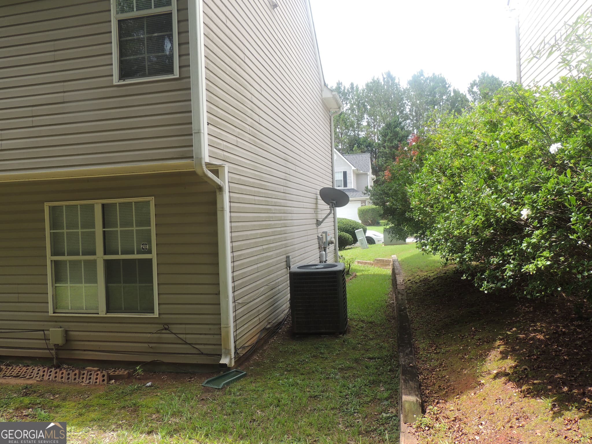 4 bedroom, 2.5 bathroom, 2,248 sq ft single family residence for sale at 6574 Lake Mill Trace, Lithonia, GA 30038 — photo 4