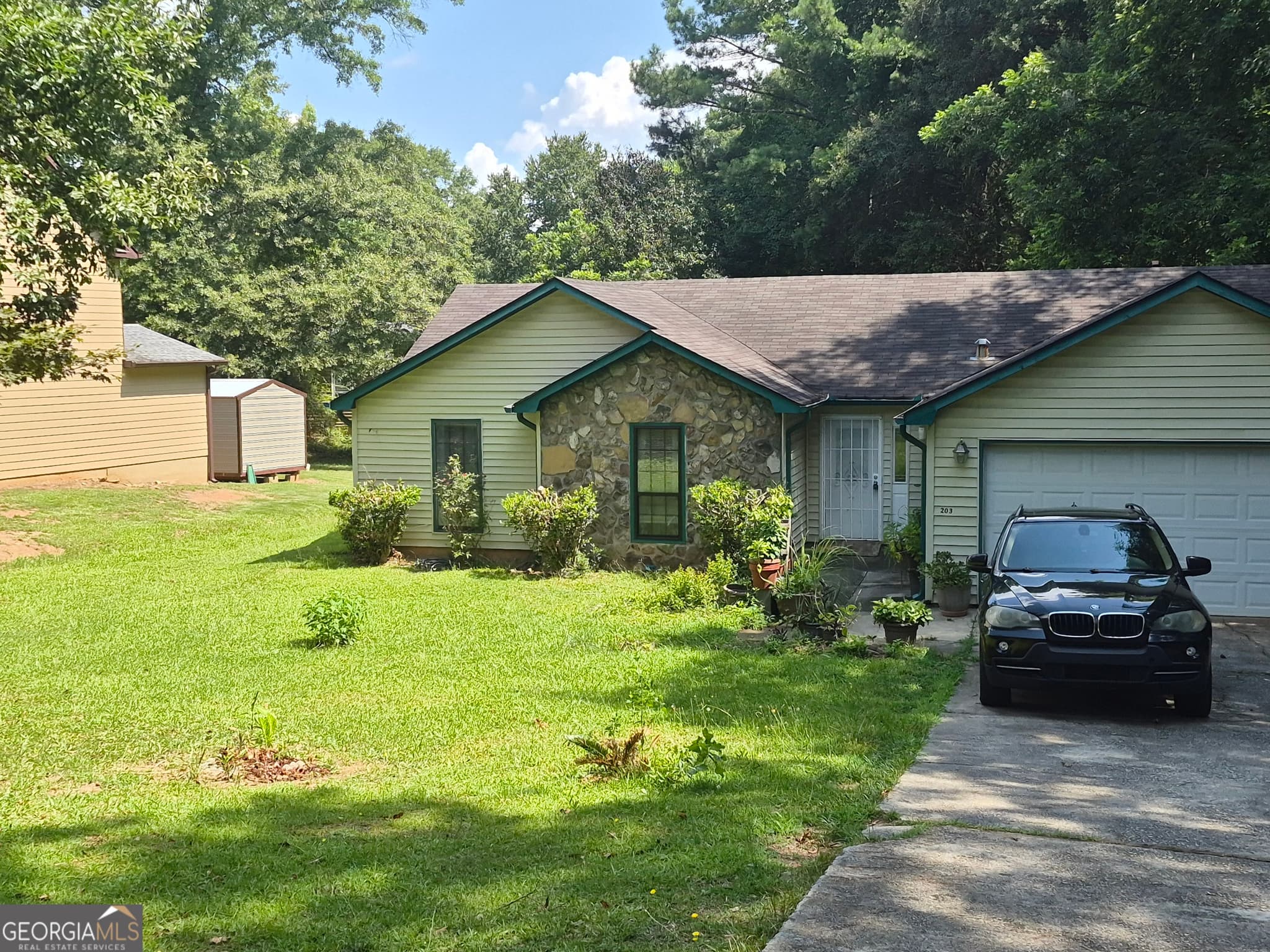 3 bedroom, 2 bathroom, 1,456 sq ft single family residence for sale at 203 Rountree Road, Riverdale, GA 30274 — photo 1 of 1