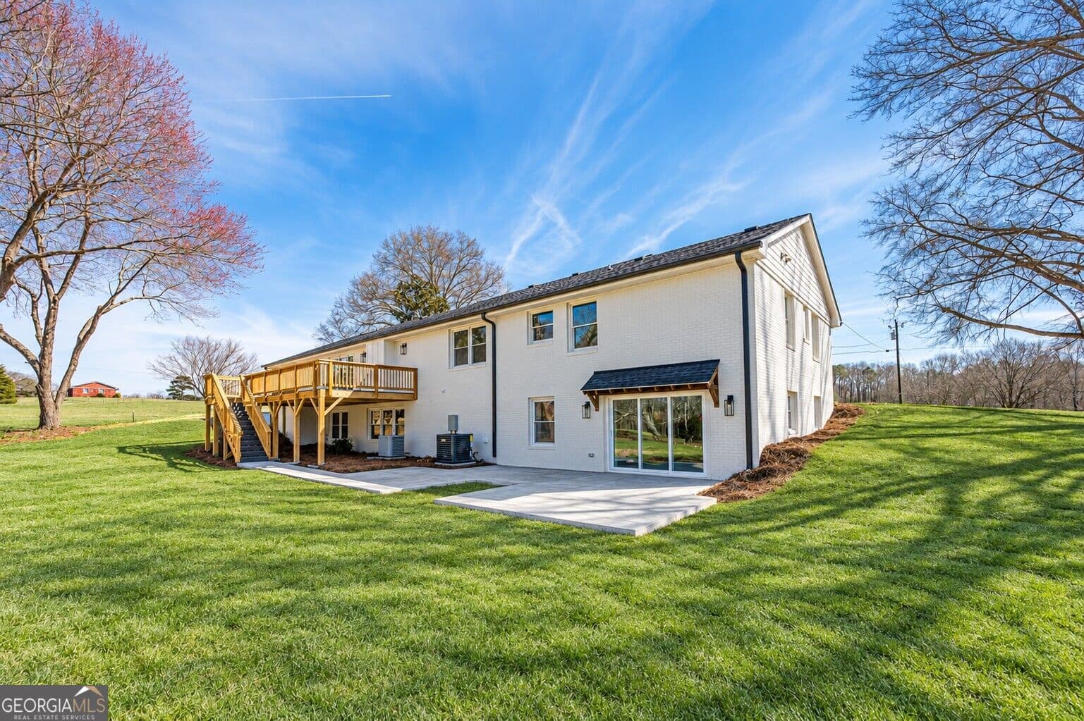 5 bedroom, 3 bathroom, 4,007 sq ft single family residence for sale at 1209 County Line Road, Cumming, GA 30040 — photo 3