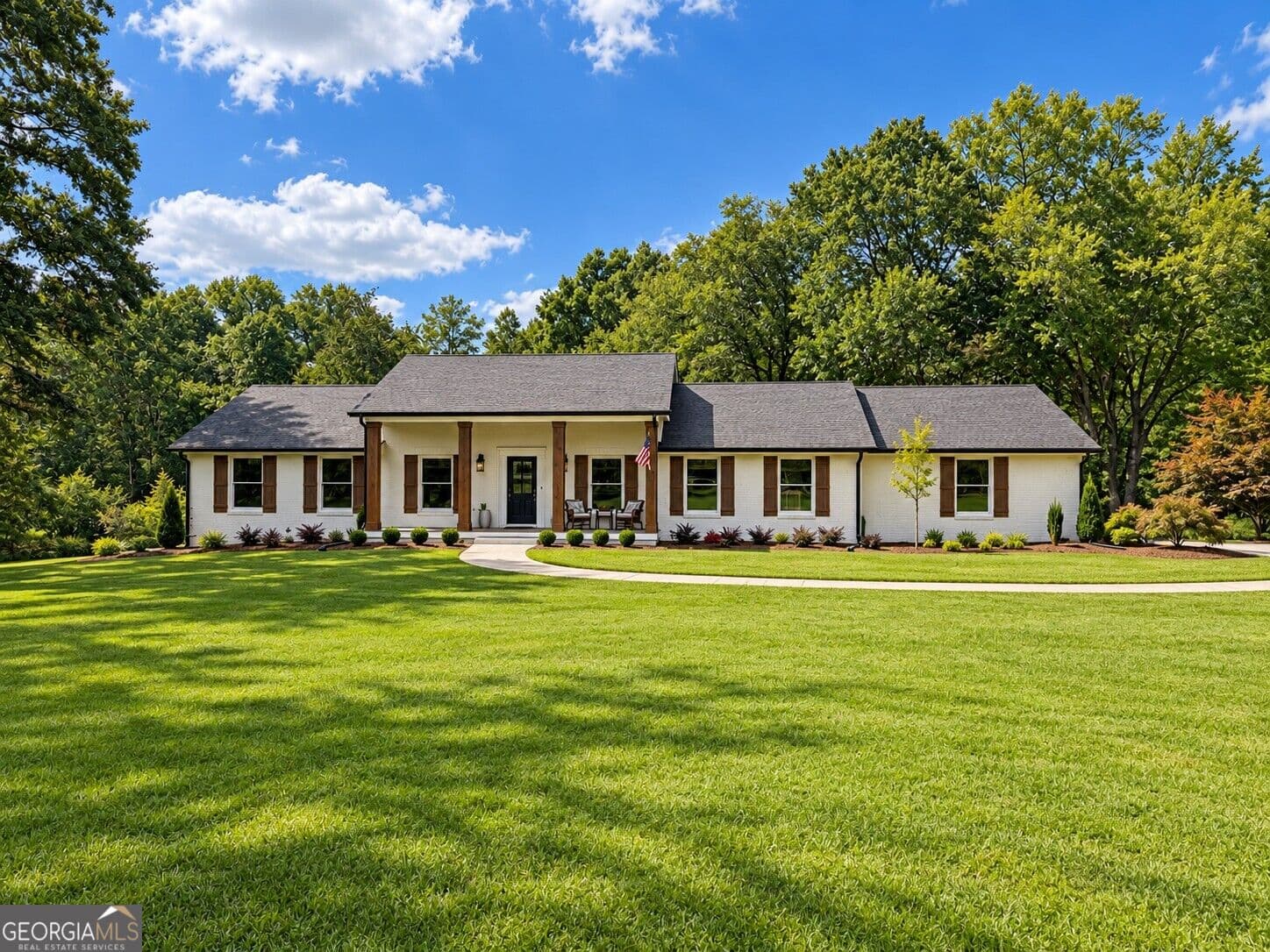 5 bedroom, 3 bathroom, 4,007 sq ft single family residence for sale at 1209 County Line Road, Cumming, GA 30040 — photo 1 of 40