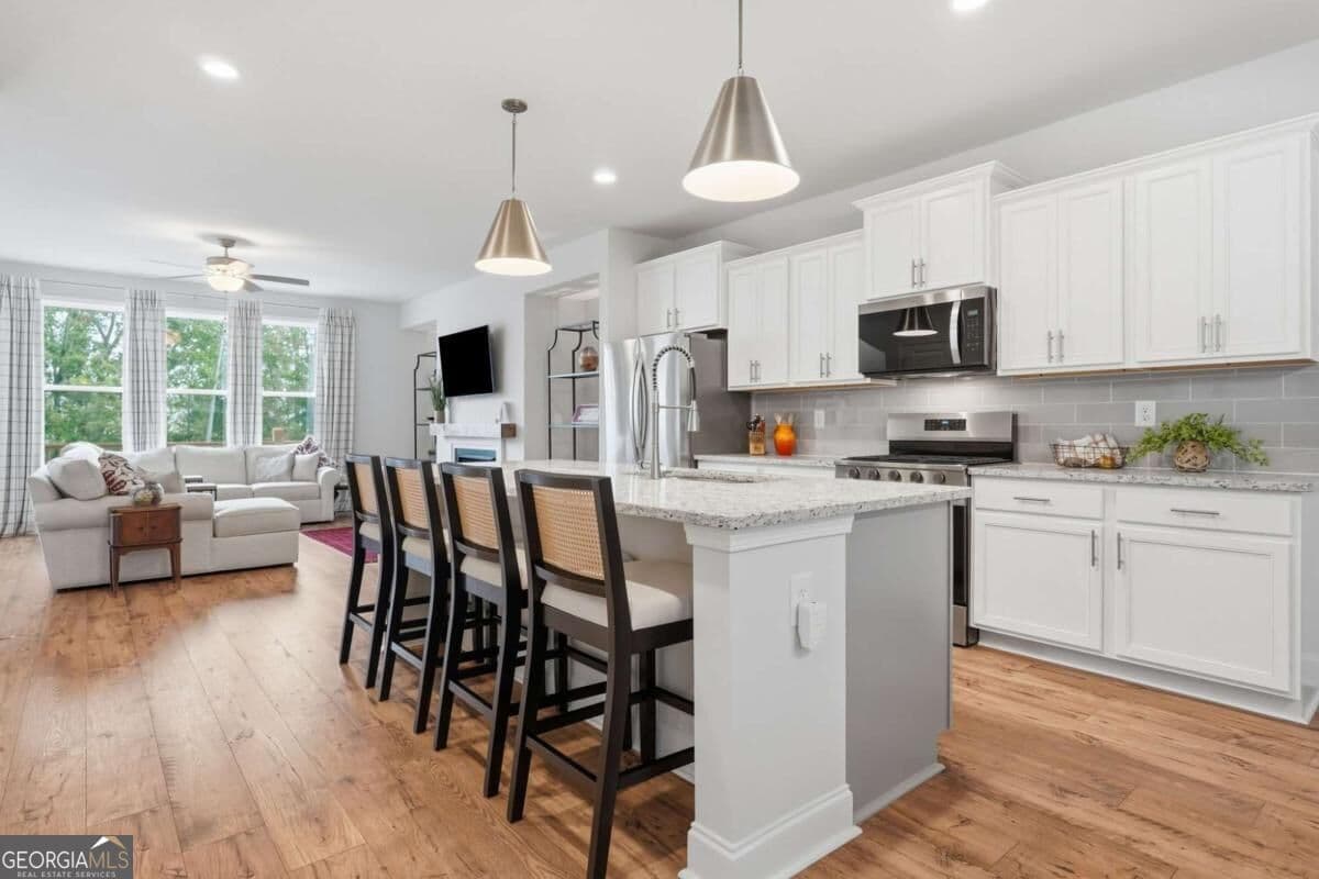 3 bedroom, 3 bathroom, 2,254 sq ft townhouse for sale at 1242 Ainsworth Alley, Sugar Hill, GA 30518
