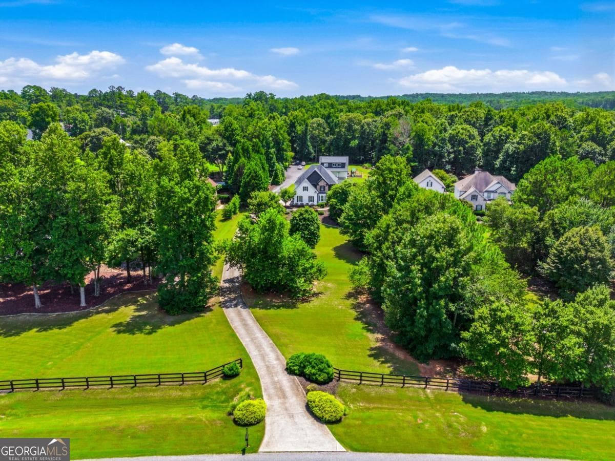 8 bedroom, 5.5 bathroom, 6,240 sq ft single family residence for sale at 124 Savanna Estates Drive, Canton, GA 30115 — photo 2