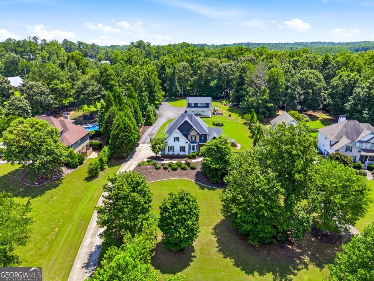 8 bedroom, 5.5 bathroom, 6,240 sq ft single family residence for sale at 124 Savanna Estates Drive, Canton, GA 30115 — photo 3